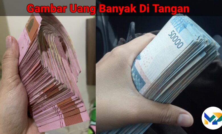 gambar uang banyak di tangan