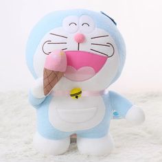 wallpaper boneka doraemon lucu makan es krim